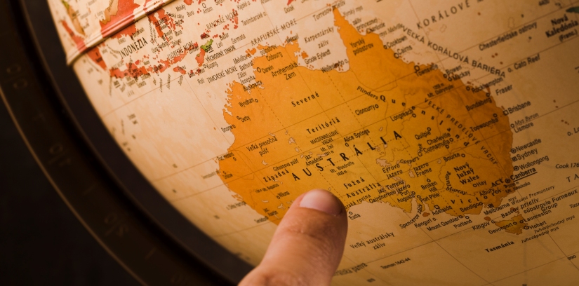 person-s-finger-pointing-australia-country-globe