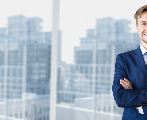 Businessman standing with arms crossed