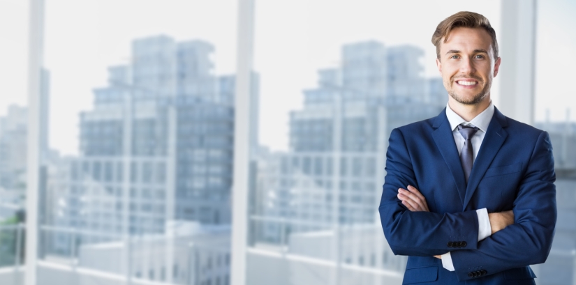 Businessman standing with arms crossed